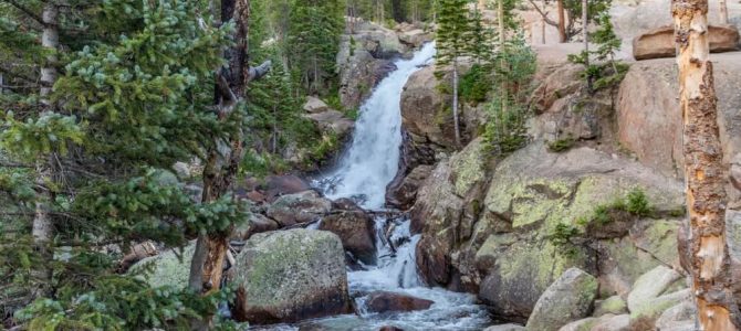 The view of a waterfall in Rocky Mountain National Park