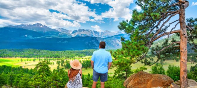 A Couple Looking at a Mountain on their Estes Park Honeymoon