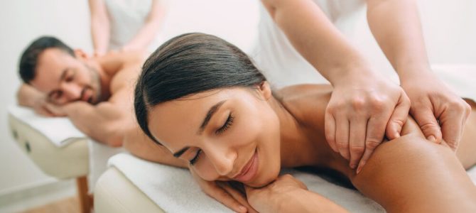 A couple enjoying a massage together on a romantic getaway to Estes Park, Colorado