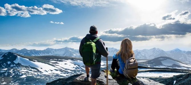 A couple on top of a mountain in Estes Park, Colorado